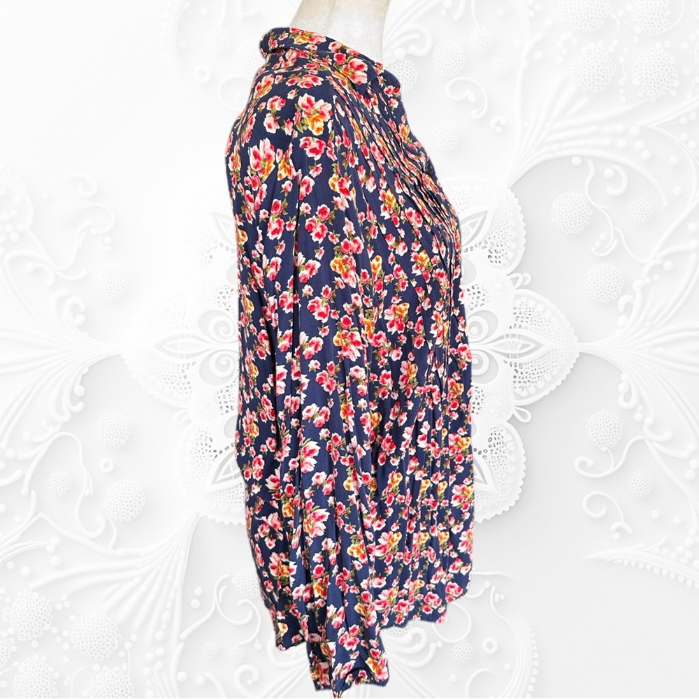 Woman Within Floral Blouse - Picture 2 of 7
